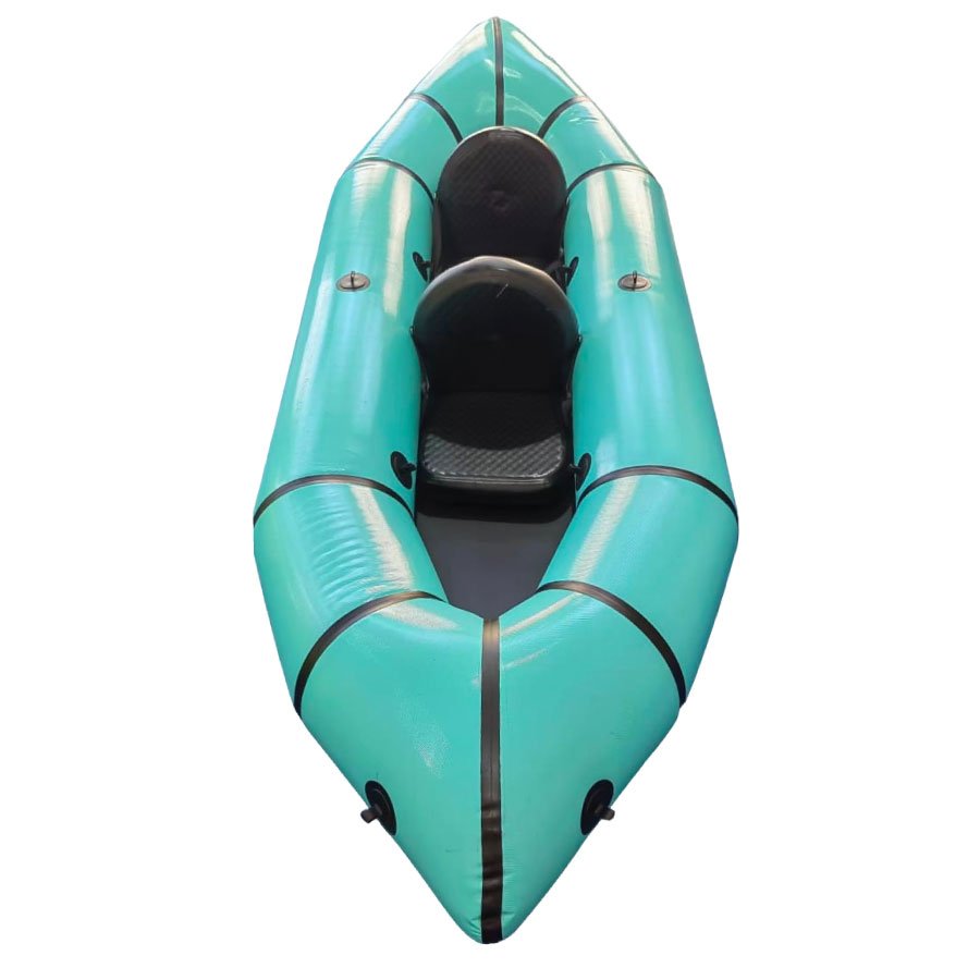 packraft-color-calipso-aventura-acuatica-rio-lago Packraft Color Calipso para dos personas en entorno de aventura natural